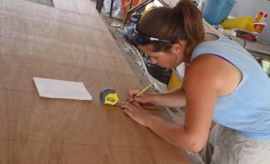 Amanda laying out computer generated points on the grid-lines