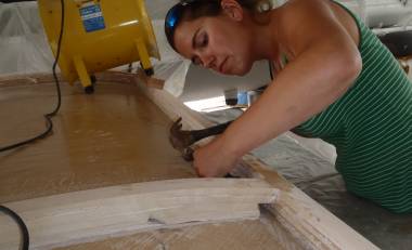 Amanda clearing the water hole between bimini sides