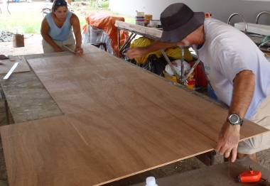 Amanda & Jon laying out a grid with a chalk snap-line