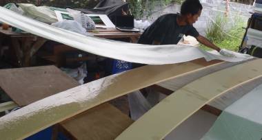 Baw glassing the long foam strips that will become the wall tops
