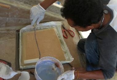 Baw's glassing in the bare foam on the underside of his hatch