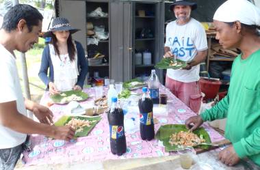 Golf, Mai, Jon & Houa having lunch at our makeshift picnic table
