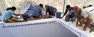 The guys cleaning the starboard side-deck