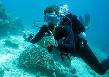 Chris checks his gauges on a dive at Batu Lima