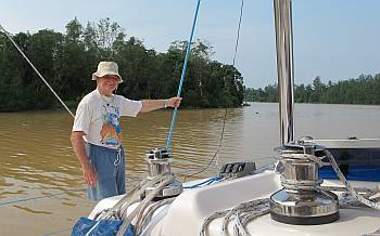 Motoring up the Kinabatangan River with Colin