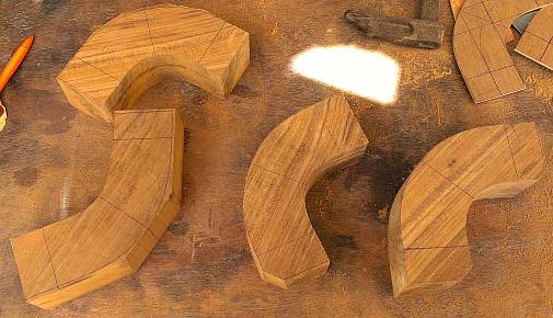 The raw teak beams cut into crude corners for the entryway