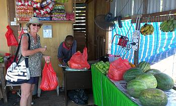 Crew Deborah helps provision on Tioman. 