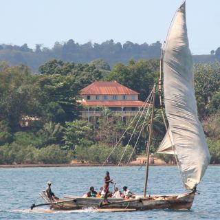 Coastal dhow running before a stiff breeze