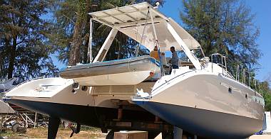 Tomcat snuggled into her davits, ready to sail