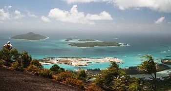 A hiker looking down from Kopolia over Eden Islnd and St Anne National Park