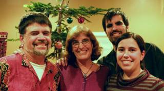 Our family in front of our wild Christmas tree