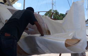 Glassing in the starboard transom extension