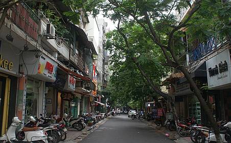 Typical Old Town back street - Vietnamese LOVE their scooters