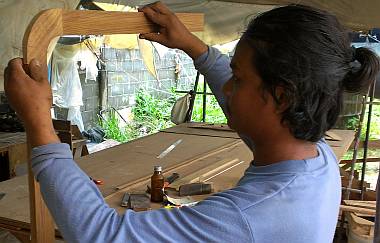 Houa fitting together the teak pieces for his entryway frame
