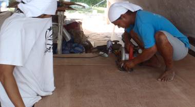 Houa cutting the new plywood for the headliners