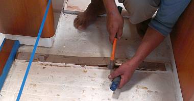 Removing a damaged floor support in the salon