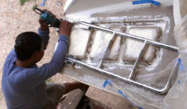 Houa readying the swim-platform for the swim-ladder hinges