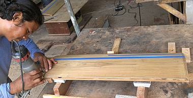 Houa cutting the teak veneer away for the thicker teak frame