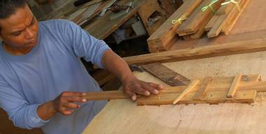 Houa with his makeshift router table & (dark) teak spring