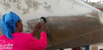 Houa reshaping the port transom near the waterline