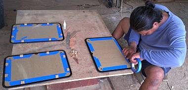 Houa preparing the acrylic - note positioning blocks glued to tape