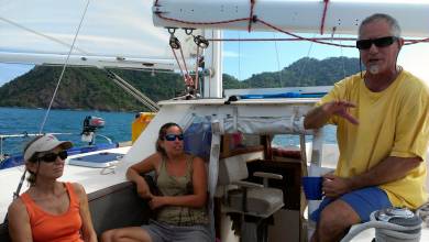 Sue and Michael from Infini with Amanda in Migration's cockpit