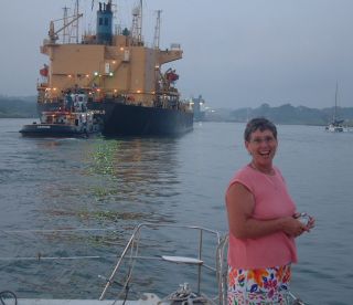 Jan on Ocelot's bow, approaching the first lock