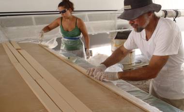 Amanda & Jon laying down the first of 4 strips of foam