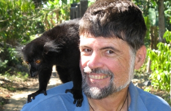 A wild Black Lemur on Jon's shoulder