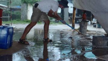 Jon frantically building dikes against the flooding waters