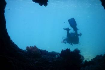 Jon exits the swim-through at C.I. Rocks