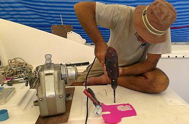 Drilling the 10mm (3/8") mounting holes for the anchor winch