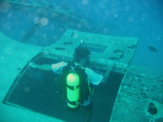 Jon descends into the cargo hatch of the Catalina