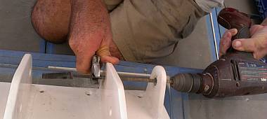 Jon machining a hole out on the anchor platform bracket