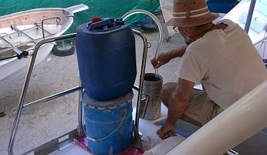 Siphoning diesel through our Baja filter & into the starboard tank