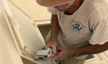 Grinding the anchor locker hatch to make it sit down flatter