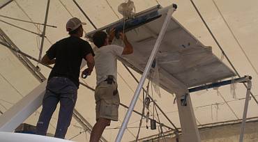 Moving the solar panels from the targa-bar aft to the davits