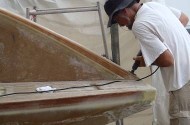 Drilling holes in the new raised wall - the railing will bolt down here