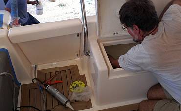 Installing the starboard aft cockpit door - it swings nicely!