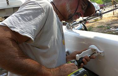 Jon installing one of our folding lower mast steps