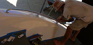 Jon installing the starboard sugar-scoop grab-rail