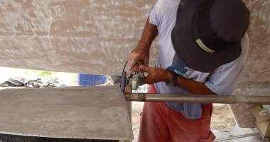 Jon polishing up our stainless steel rudders