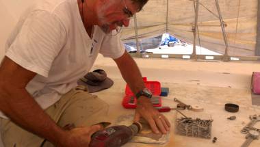 Jon making round tapered plugs with a hand-drill and sandpaper