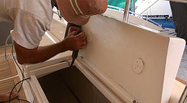 Sanding the edges of the lockers under the aft cockpit seats