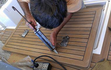 Installing the big hinges on the big starboard cockpit hatch