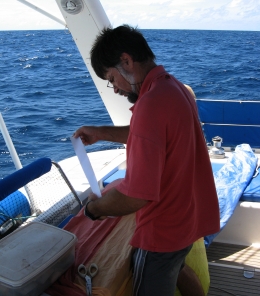 Jon does much needed spinnaker repair