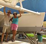 Jon and Sue celebrating getting the forebeam remounted.