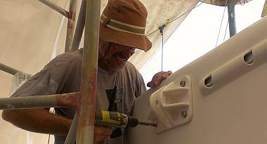 Jon mounting the starboard forebeam bracket