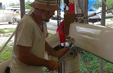 "Tuning" the mast - note sighting board with nylon string