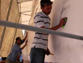 The guys wet-sanded starboard during the spray